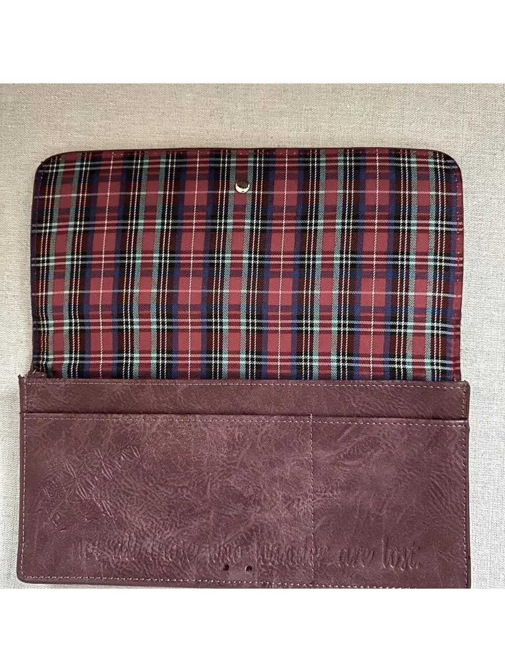 Vintage Wanderlust burgundy leather passport / travel wallet with plaid lining.